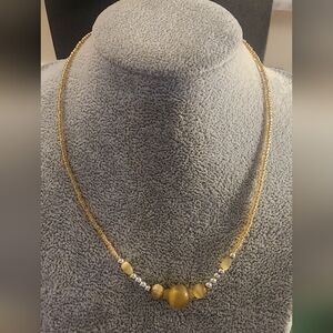 Elegant Gold and Silver Beaded Necklace.